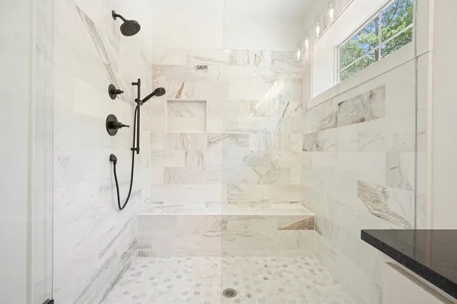 a room with a bed and a window