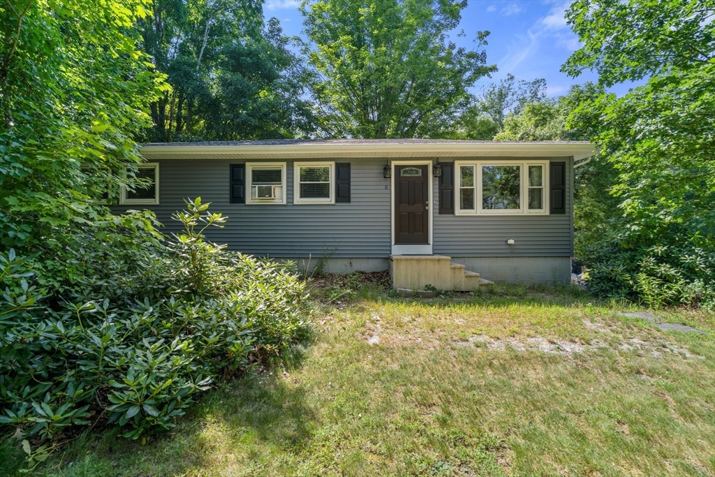 5 Flint Road Tyngsboro, MA 01879 - Photo 1 of 31 a house view with a garden space