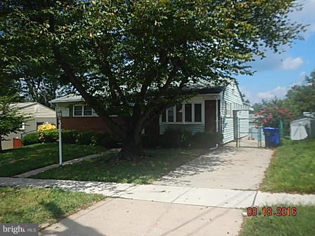 12907 Holdridge Road Silver Spring, MD 20906 - Photo 2 of 14 a front view of a house with garden