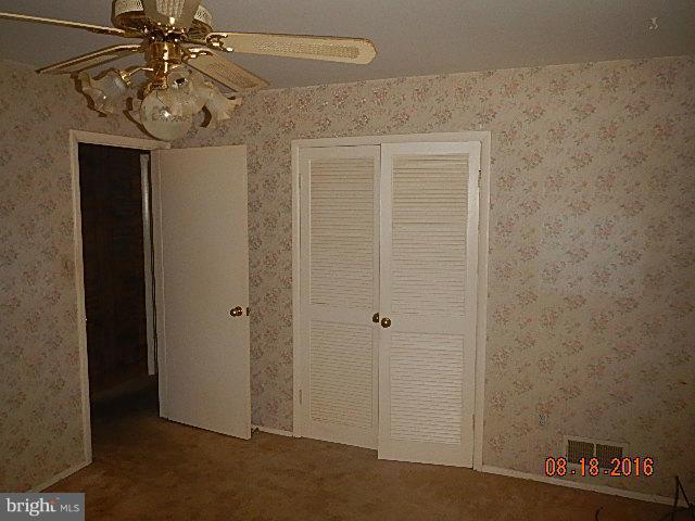 12907 Holdridge Road Silver Spring, MD 20906 - Photo 10 of 14 a view of a hallway