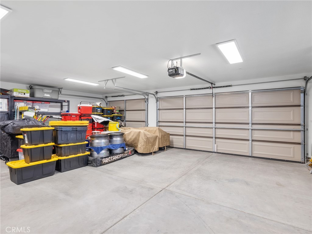22427 Huasna Road Apple Valley, CA 92307 - Photo 32 of 39 a storage room with lots of furniture