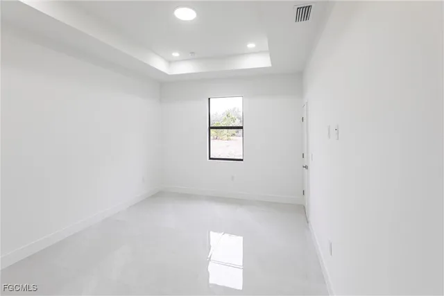 an empty room with windows