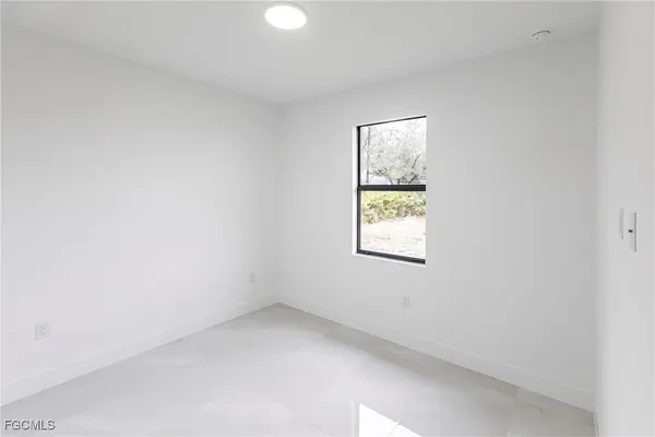 an empty room with a window
