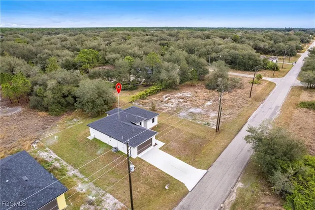 a view of a balcony with an outdoor seating