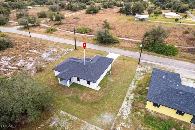 a view of swimming pool with a yard