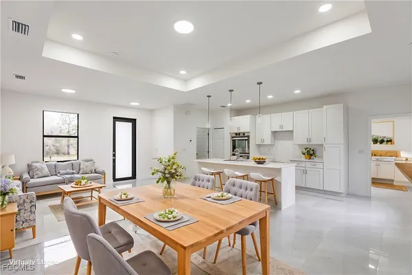 a view of a dining room kitchen and a window