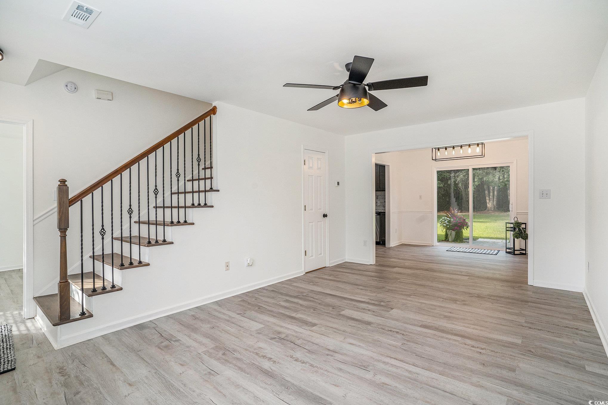 2595 Buck Scrape Road Myrtle Beach, SC 29588 - Photo 5 of 36 Living room into dining room