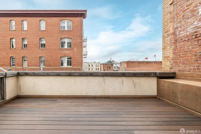 a view of city from terrace with seating space