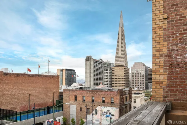 a view of city with tall buildings