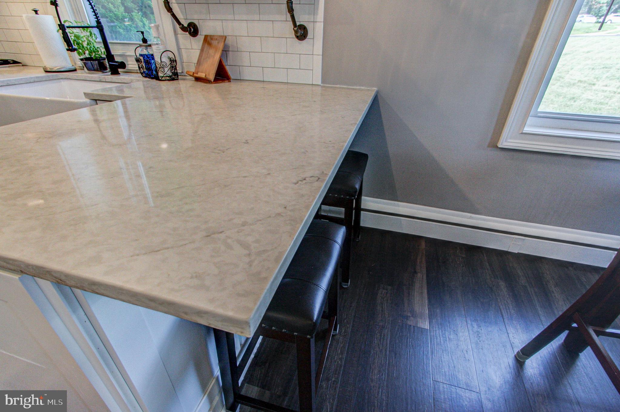 1310 Cloverly Road Warminster, PA 18974 - Photo 9 of 52 Quartz Counter w/ Bar Stool Area
