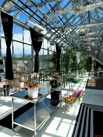 a outdoor space with lots of tables and chairs