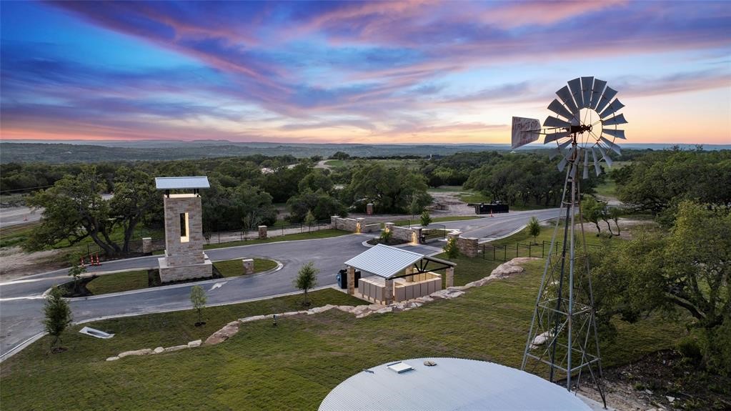 a view of a swimming pool and lounge chairs