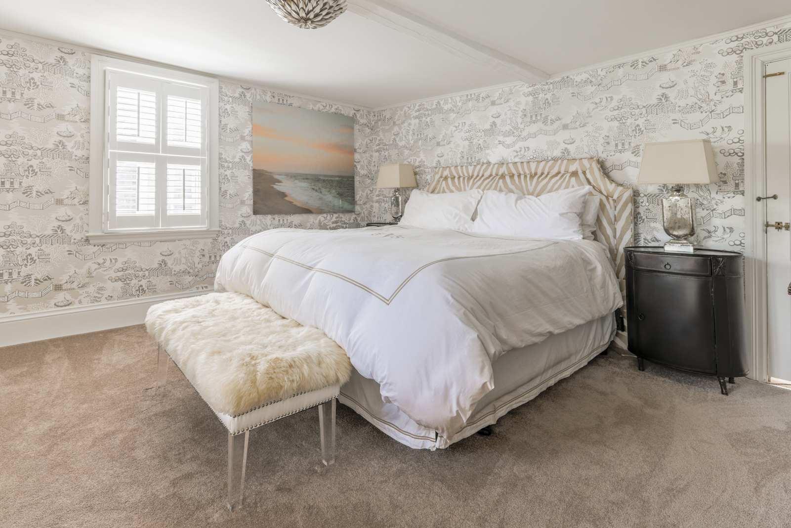 12 Hussey Street Nantucket, MA 02554 - Photo 23 of 47 a bedroom with a bed and a table