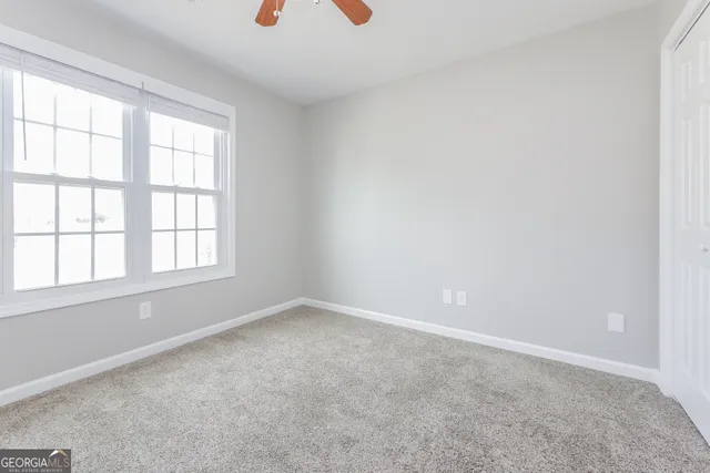 an empty room with windows