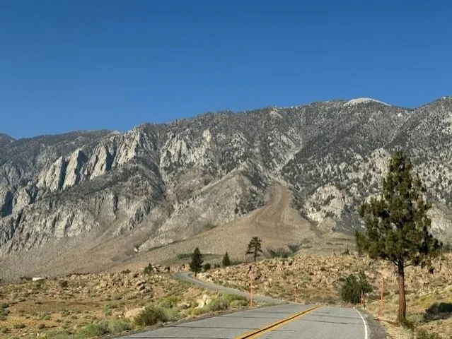 a view of a snow on the mountain