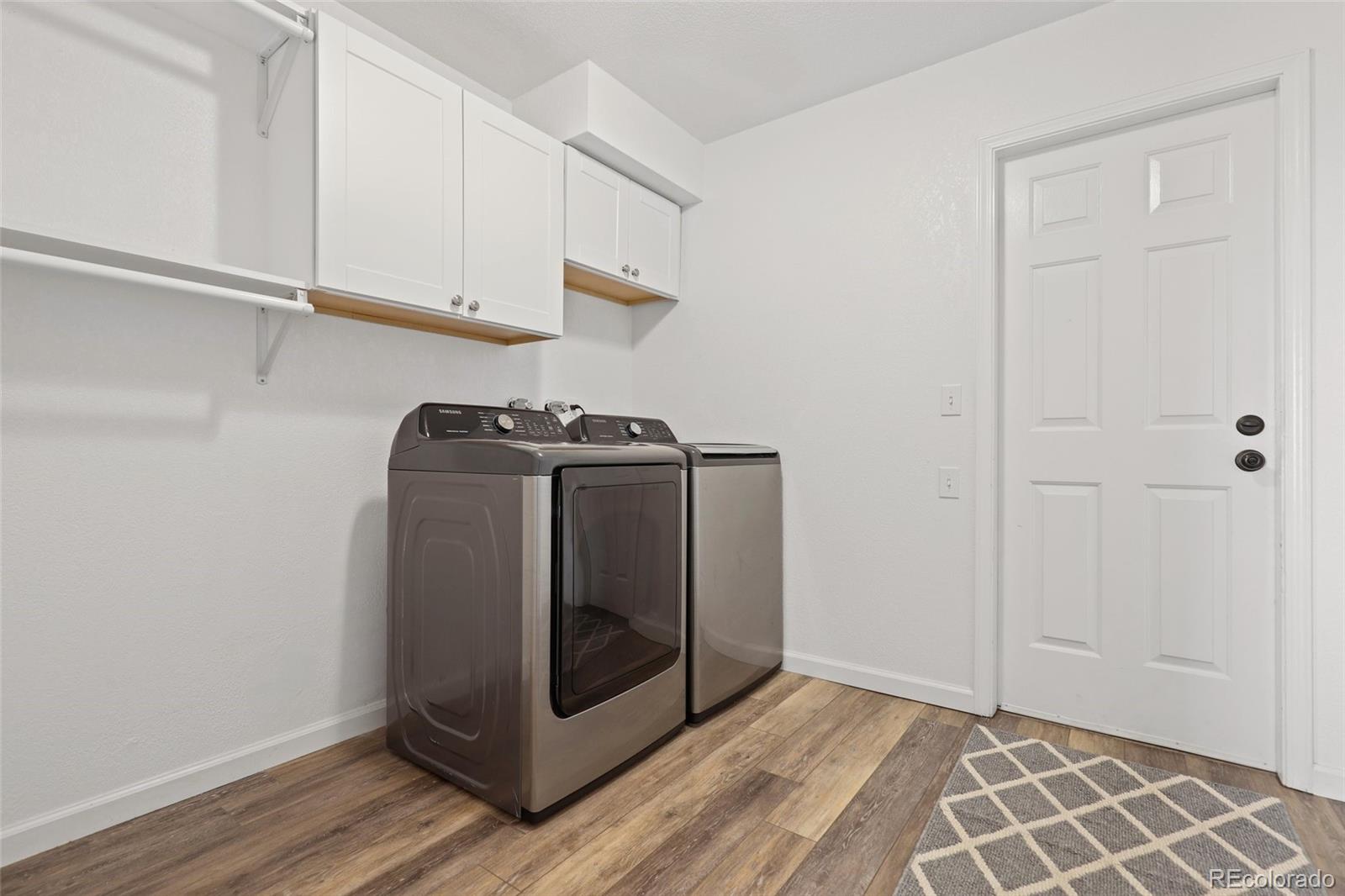 5484 South Cimarron Road Littleton, CO 80123 - Photo 20 of 40 a utility room with cabinets