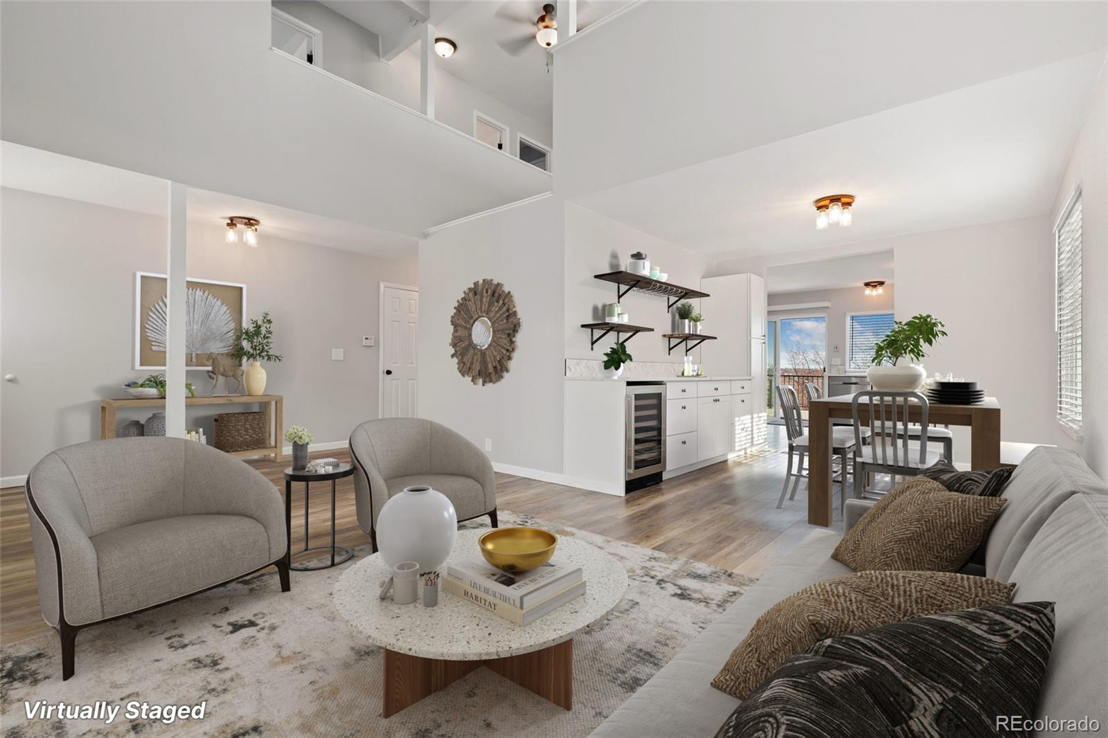 5484 South Cimarron Road Littleton, CO 80123 - Photo 4 of 40 a living room with furniture and wooden floor