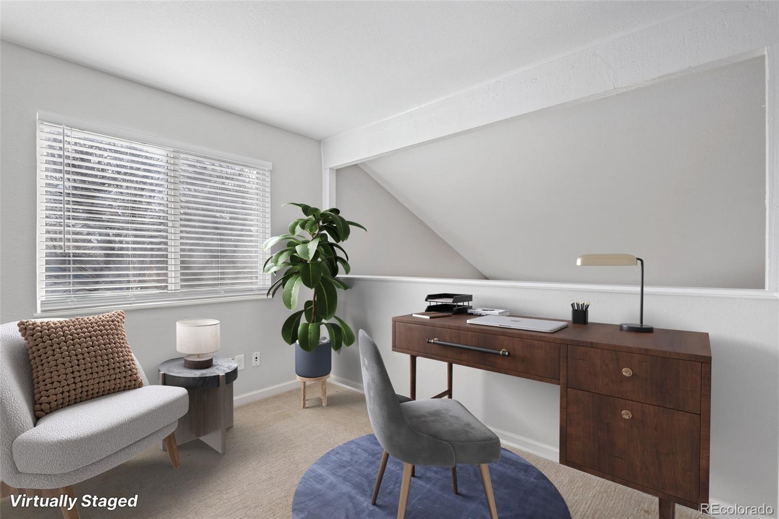 5484 South Cimarron Road Littleton, CO 80123 - Photo 7 of 40 a living room with furniture and a potted plant