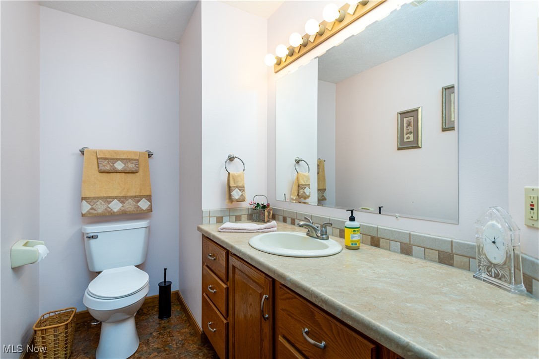310 Reimer Road Wadsworth, OH 44281 - Photo 24 of 38 Half bath on 1st floor featuring a vanity.