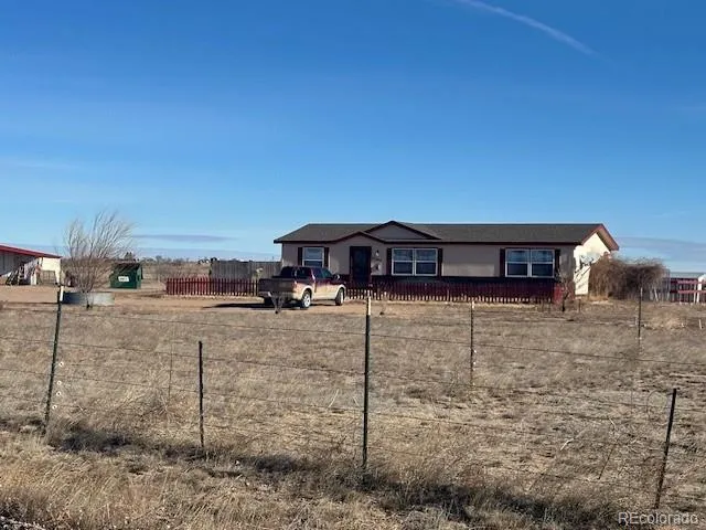 $459,900 | 57048 County Road 21, Carr, CO 80612