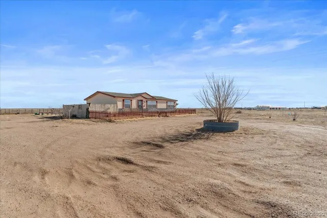$459,900 | 57048 County Road 21, Carr, CO 80612