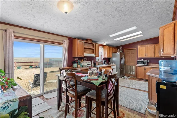 $459,900 | 57048 County Road 21, Carr, CO 80612