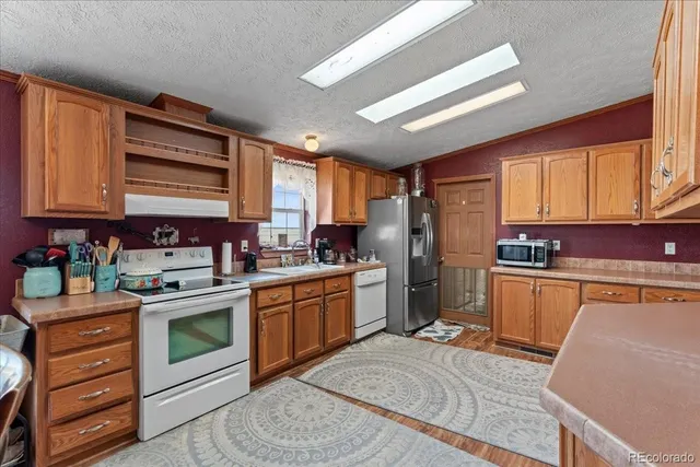 $459,900 | 57048 County Road 21, Carr, CO 80612