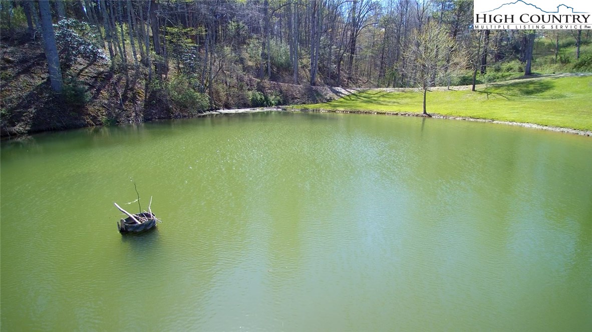 3772 Spring Valley Road Elk Creek, VA 24326 - Photo 26 of 30 a view of a swimming pool with a yard