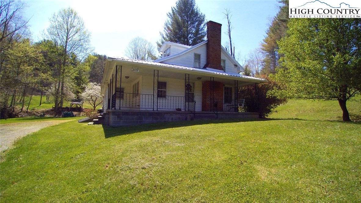 3772 Spring Valley Road Elk Creek, VA 24326 - Photo 29 of 30 a view of a house with a yard