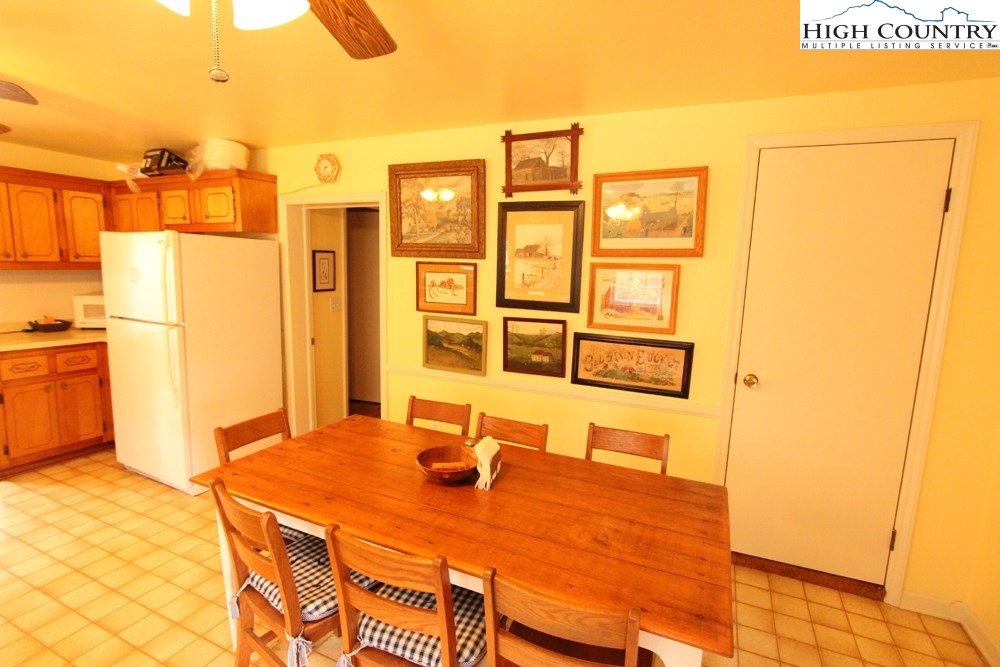 3772 Spring Valley Road Elk Creek, VA 24326 - Photo 6 of 30 a view of a dining room with furniture