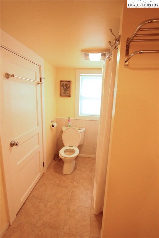 3772 Spring Valley Road Elk Creek, VA 24326 - Photo 9 of 30 a bathroom with a toilet and a shower