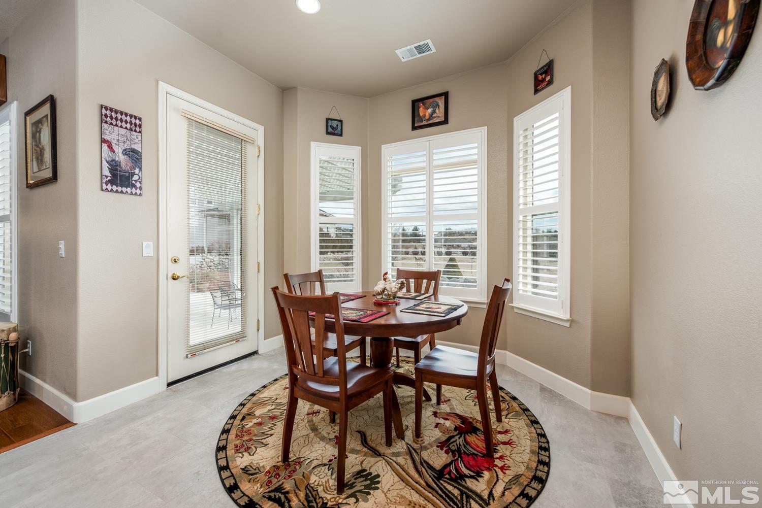2603 Skyline Drive Minden, NV 89423 - Photo 17 of 40 a view of a dining room with furniture and a window
