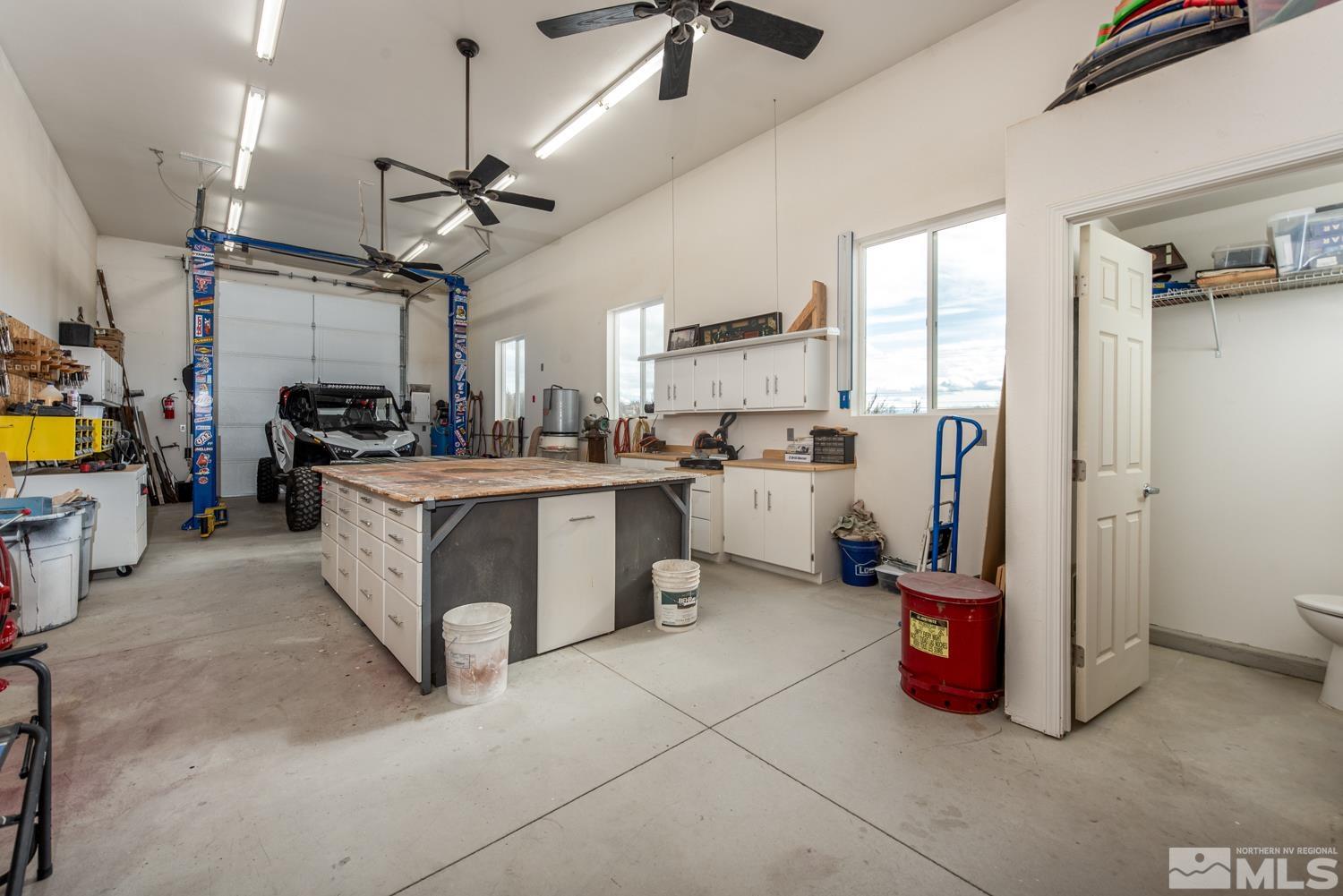 2603 Skyline Drive Minden, NV 89423 - Photo 35 of 40 a kitchen with a sink appliances and cabinets