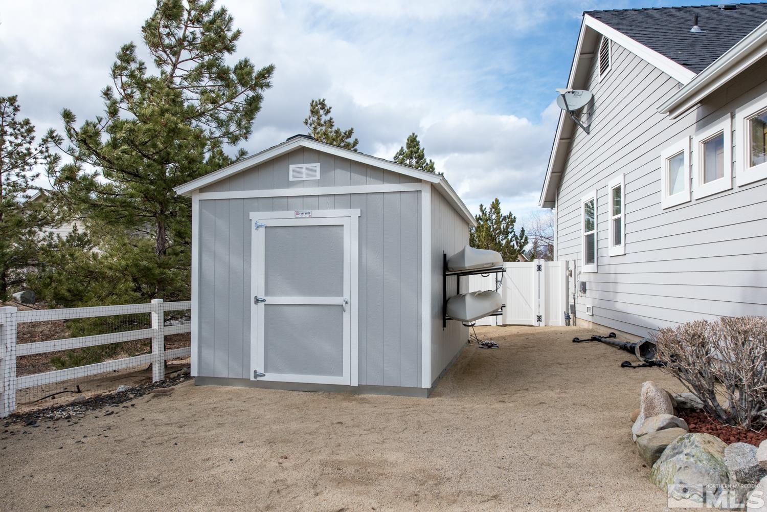 2603 Skyline Drive Minden, NV 89423 - Photo 38 of 40 a view of a house with a yard and garage
