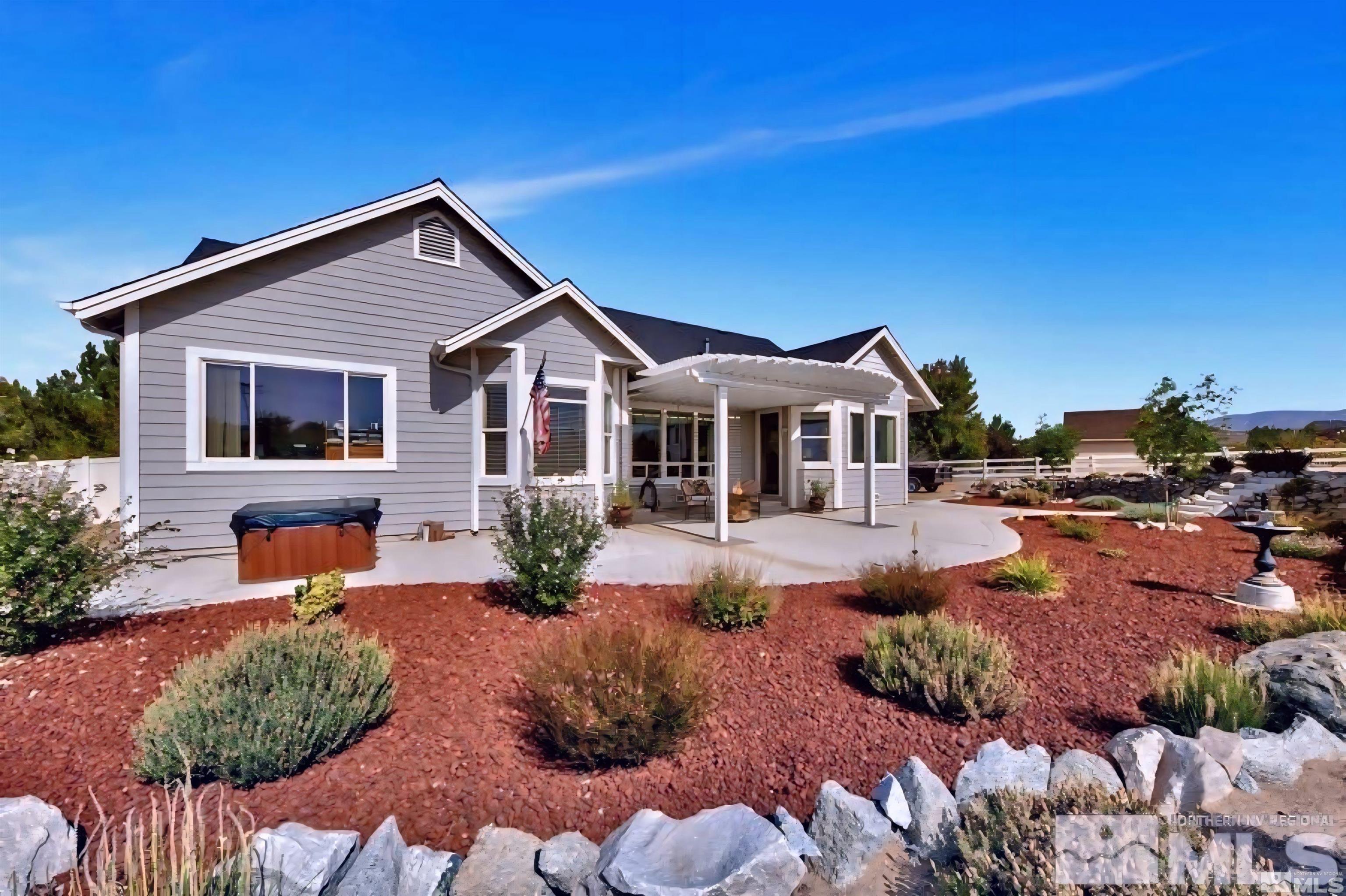 2603 Skyline Drive Minden, NV 89423 - Photo 6 of 40 a front view of a house with a yard