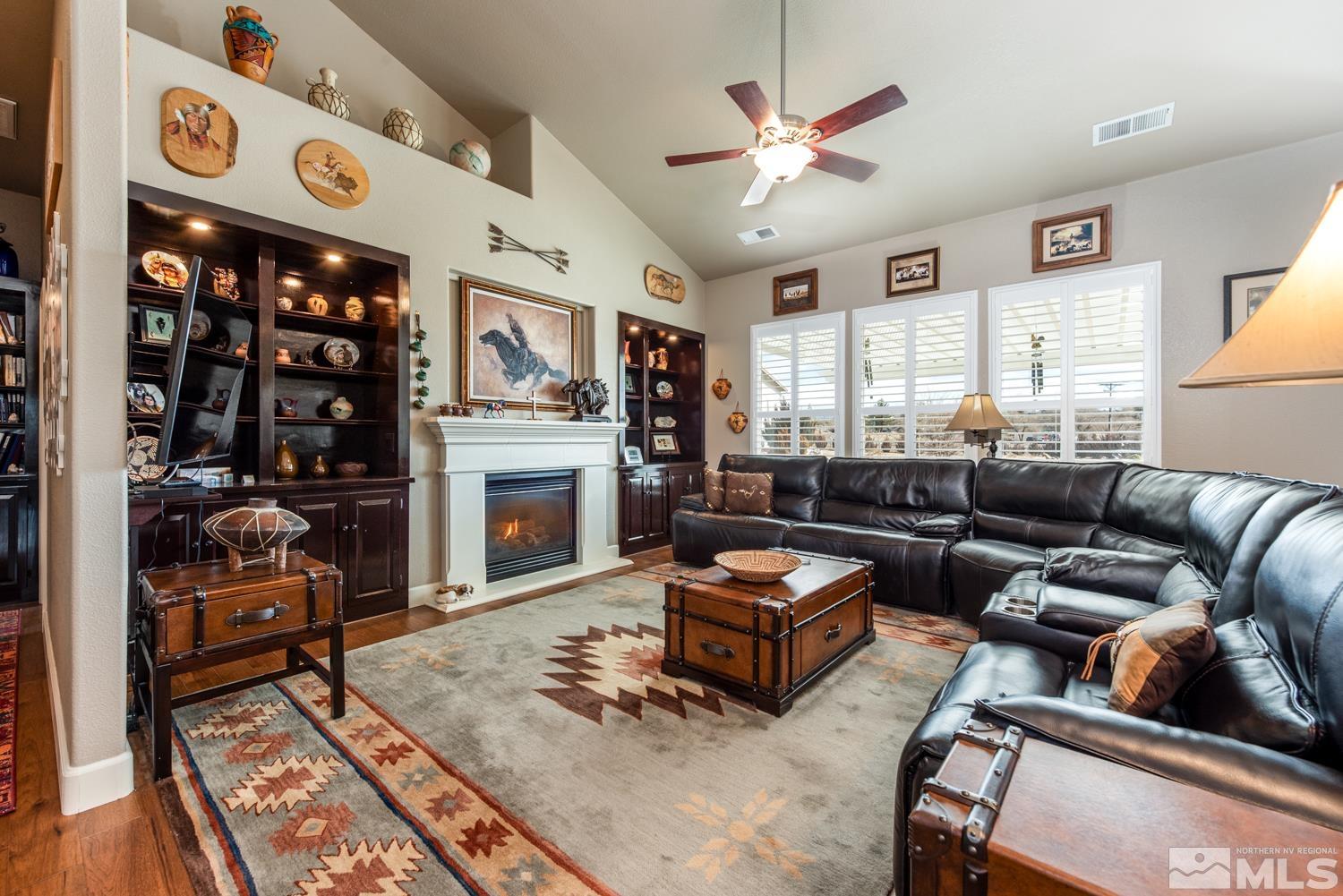 2603 Skyline Drive Minden, NV 89423 - Photo 8 of 40 a living room with furniture fireplace and window