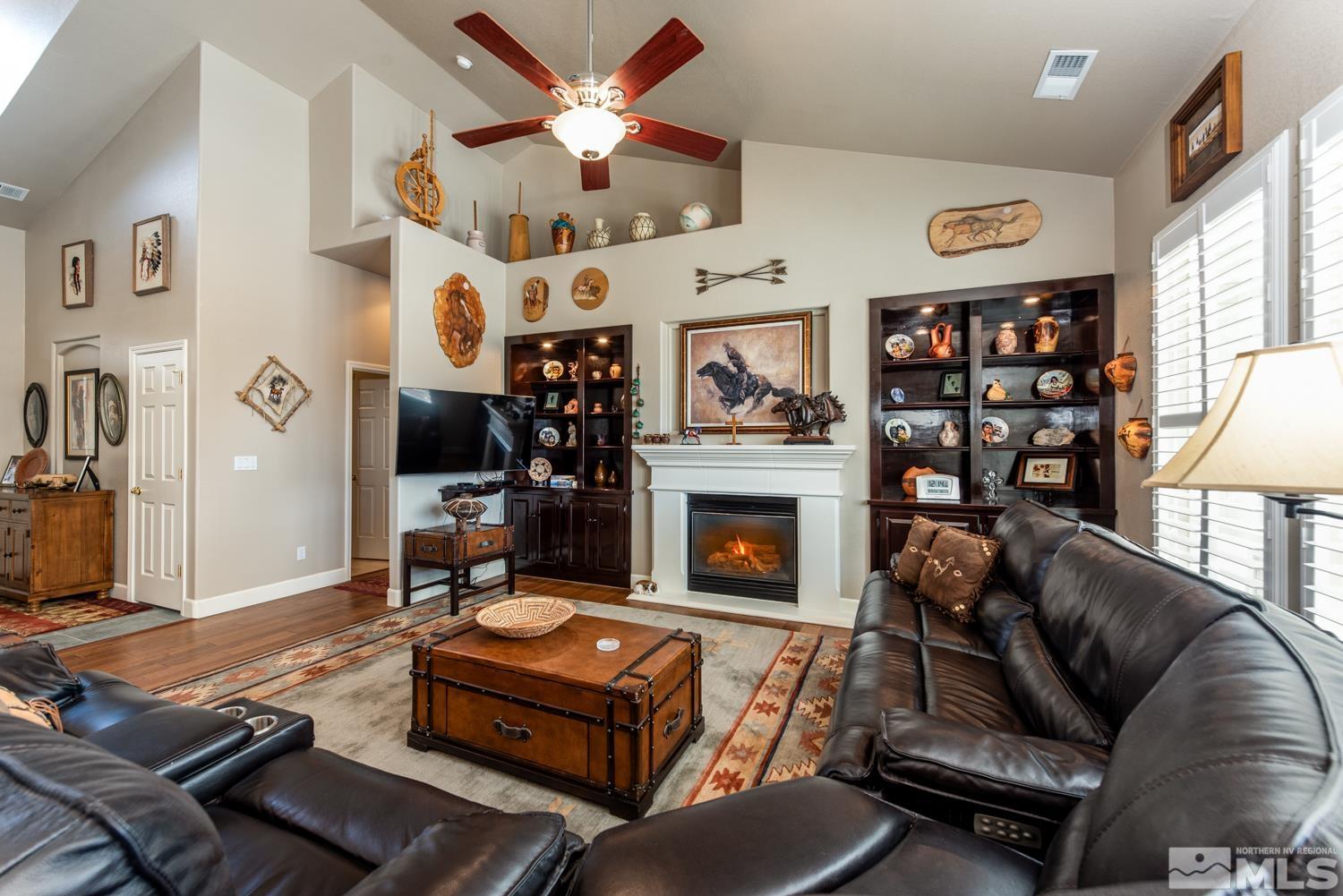 2603 Skyline Drive Minden, NV 89423 - Photo 9 of 40 a living room with furniture fireplace and flat screen tv