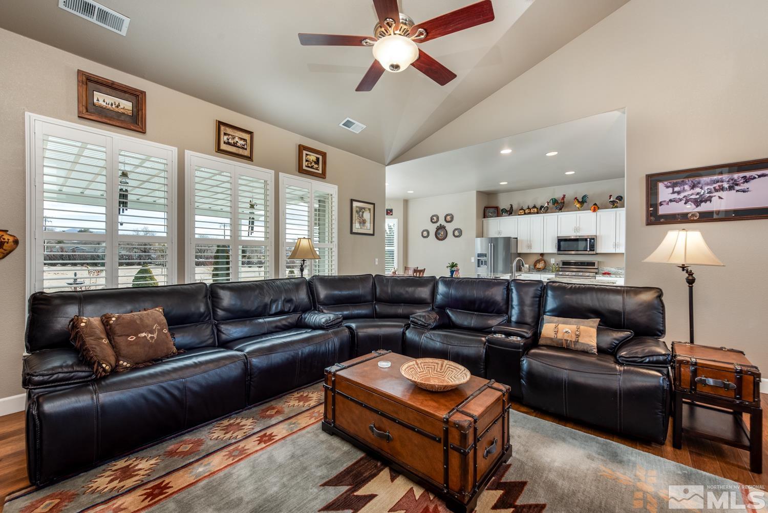 2603 Skyline Drive Minden, NV 89423 - Photo 10 of 40 a living room with furniture ceiling fan and a window