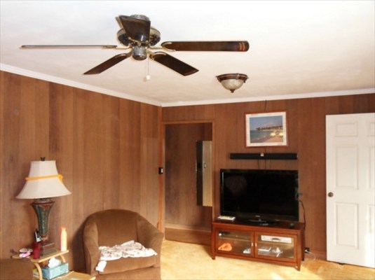 4081 Koloa Road Koloa, HI 96756 - Photo 3 of 6 a living room with furniture and a flat screen tv