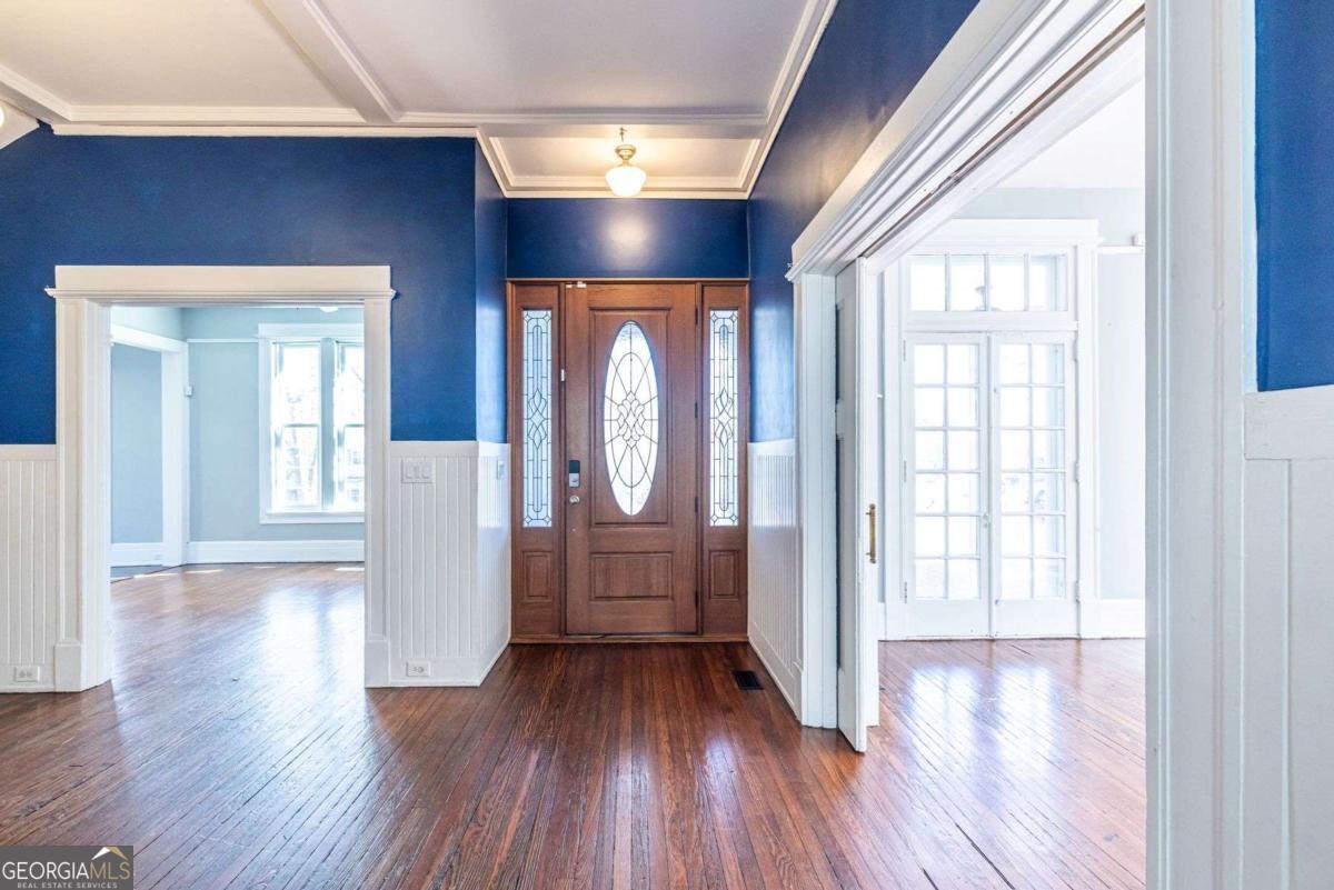 692 Myrtle Street Northeast Atlanta, GA 30308 - Photo 12 of 73 a view of gallery with wooden floor and fan