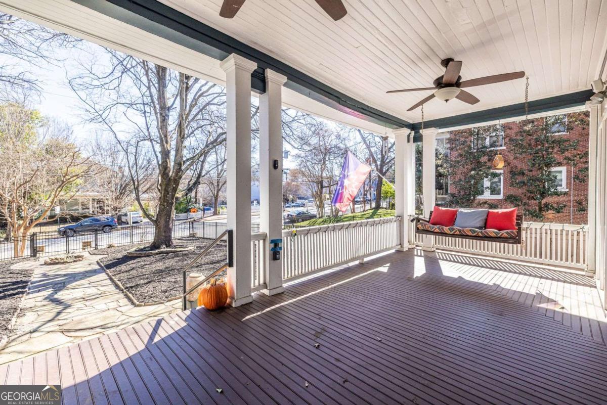 692 Myrtle Street Northeast Atlanta, GA 30308 - Photo 6 of 73 a sitting area with furniture and wooden floor