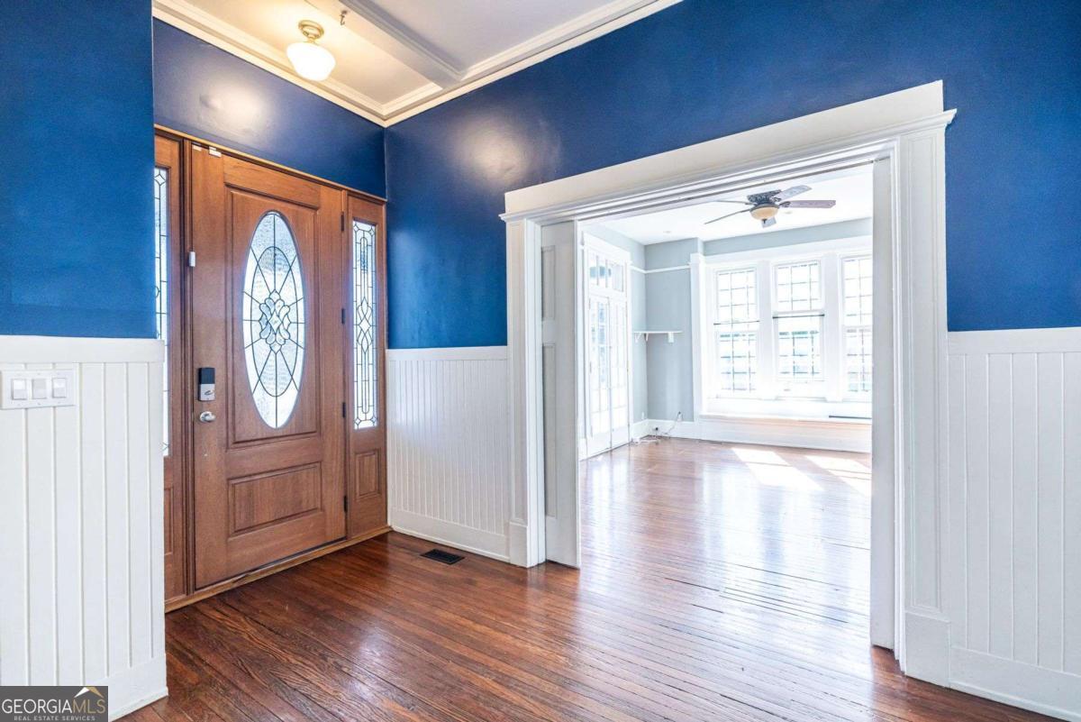 692 Myrtle Street Northeast Atlanta, GA 30308 - Photo 8 of 73 a view of an entryway with wooden floor