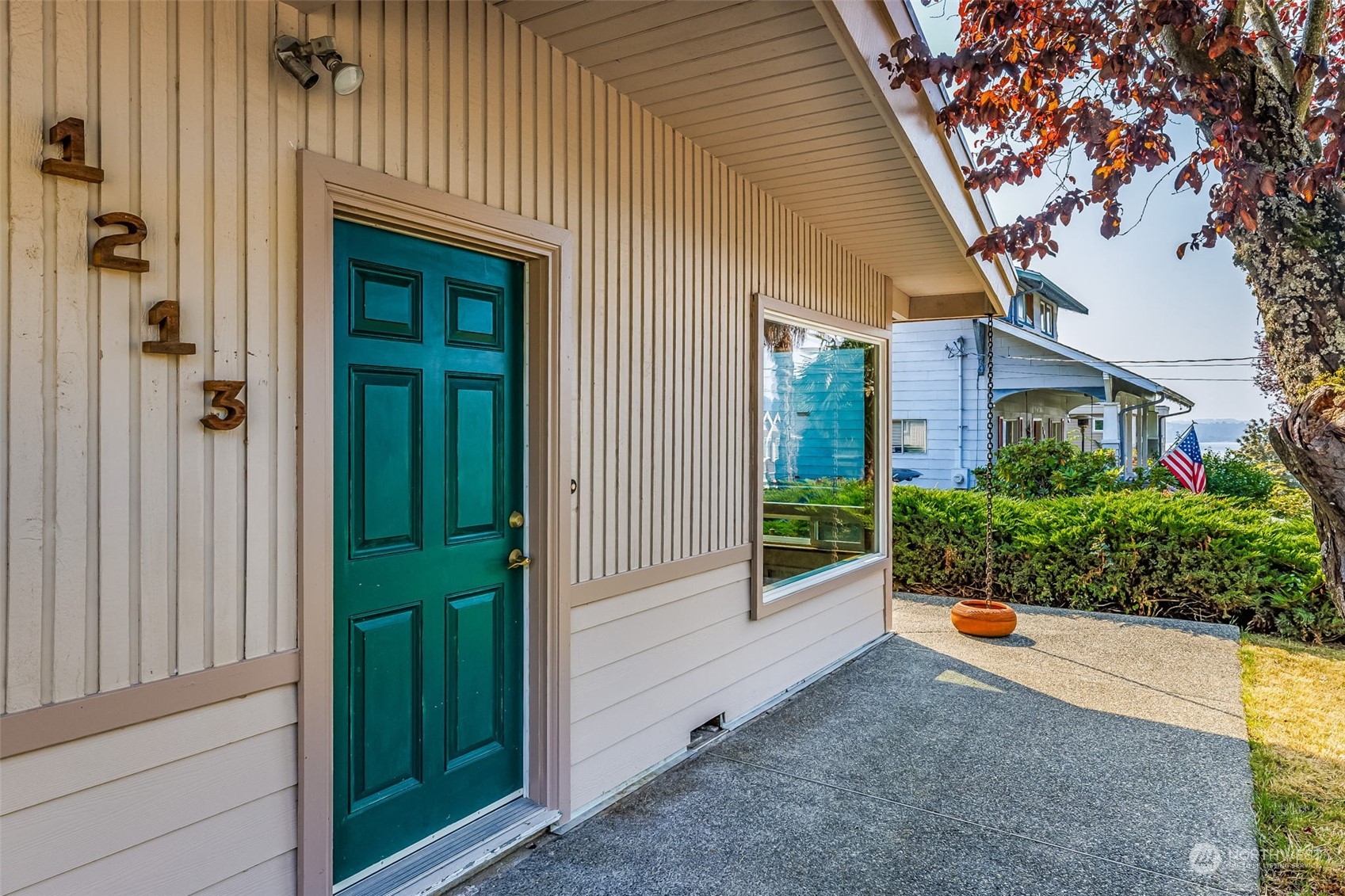 1213 North 33rd Street Renton, WA 98056 - Photo 1 of 28 a front view of a house with a porch