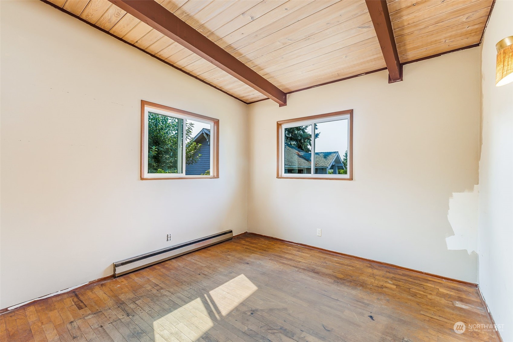 1213 North 33rd Street Renton, WA 98056 - Photo 15 of 28 a view of empty room with wooden floor