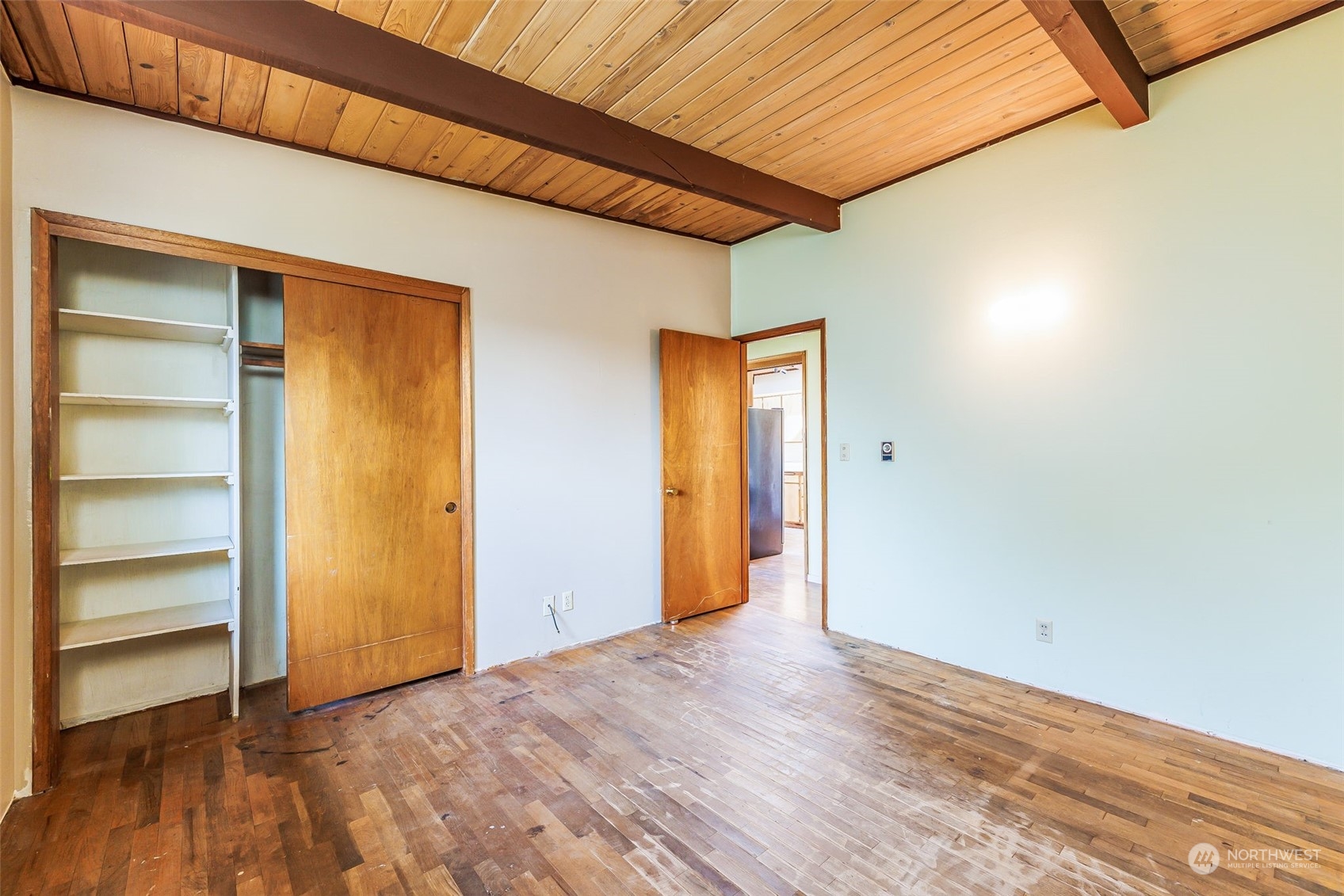 1213 North 33rd Street Renton, WA 98056 - Photo 16 of 28 a view of an empty room with a closet