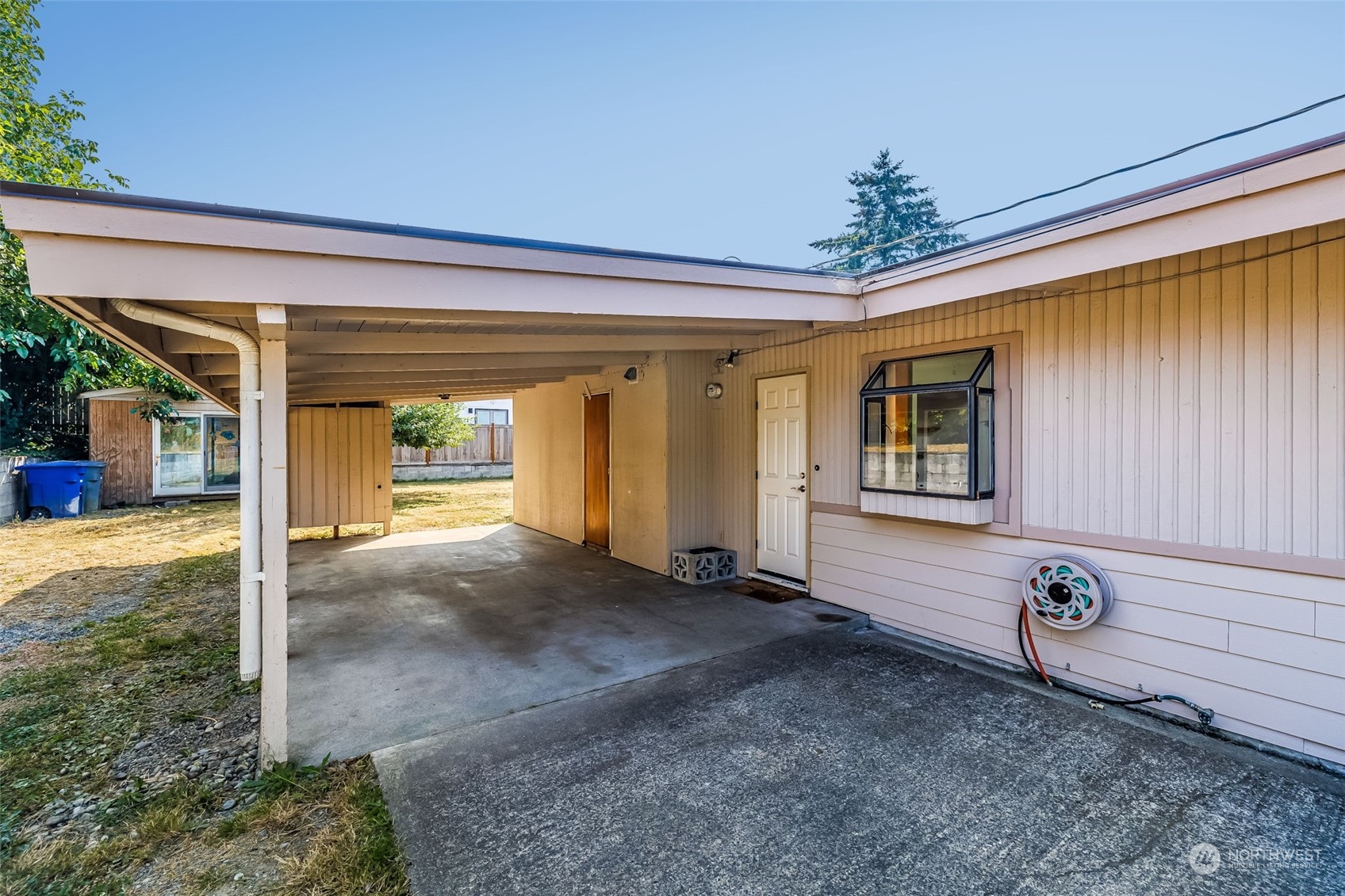 1213 North 33rd Street Renton, WA 98056 - Photo 3 of 28 a view of a porch with seating space
