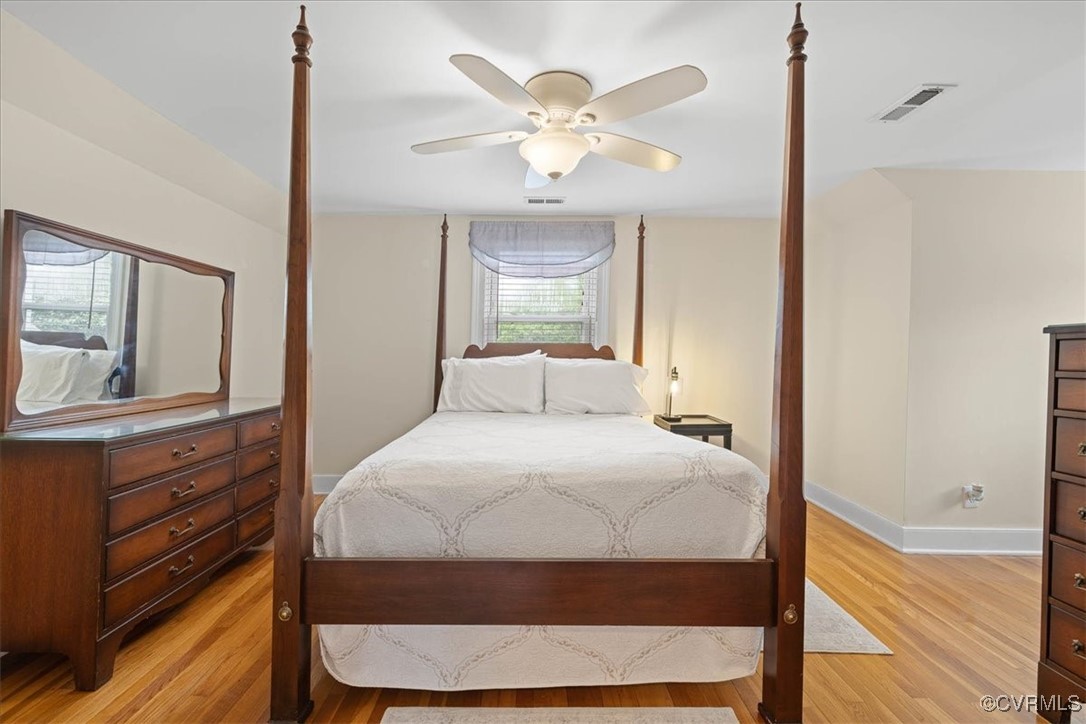1926 Point Of Rocks Road Chester, VA 23836 - Photo 20 of 29 a bedroom with a bed mirror and a window