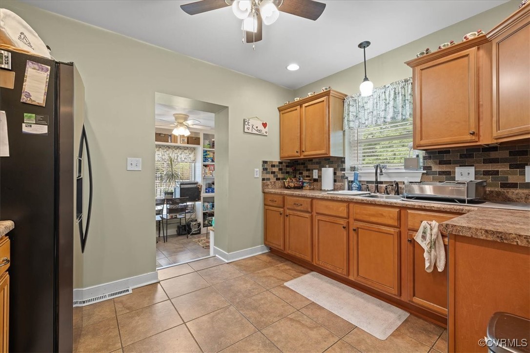 1926 Point Of Rocks Road Chester, VA 23836 - Photo 8 of 29 a kitchen with stainless steel appliances granite countertop a refrigerator and a sink