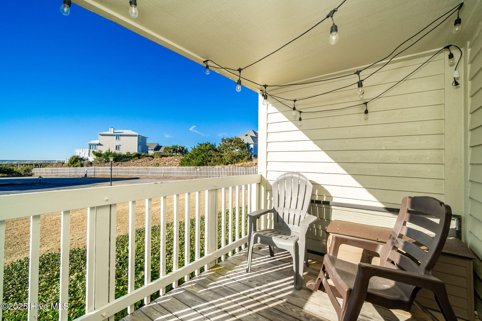 10300 Coast Guard Road, Unit C103 POINT EMERALD VILLAS Emerald Isle, NC 28594 - Photo 8 of 44 Covered porch w/ water views