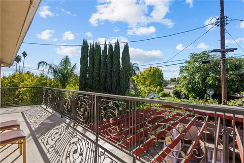 a kitchen with a sink stove and microwave
